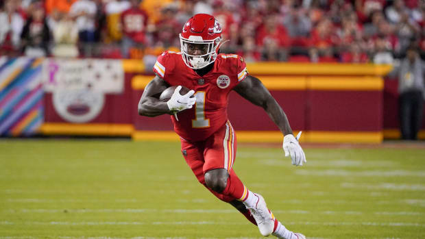 Oct 10, 2021; Kansas City, Missouri, USA; Kansas City Chiefs running back Jerick McKinnon (1) runs the ball against the Buffalo Bills during the first half at GEHA Field at Arrowhead Stadium. Mandatory Credit: Denny Medley-USA TODAY Sports
